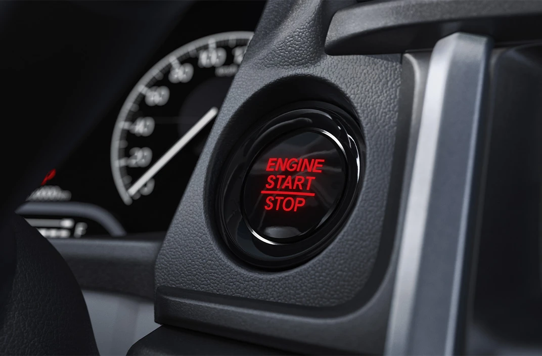 Botão de partida do motor (START/STOP)