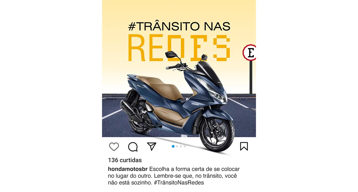 Post Instagram sobre maio amarelo com imagem de uma motocicleta PCX e a frase "trânsito nas redes" ao fundo