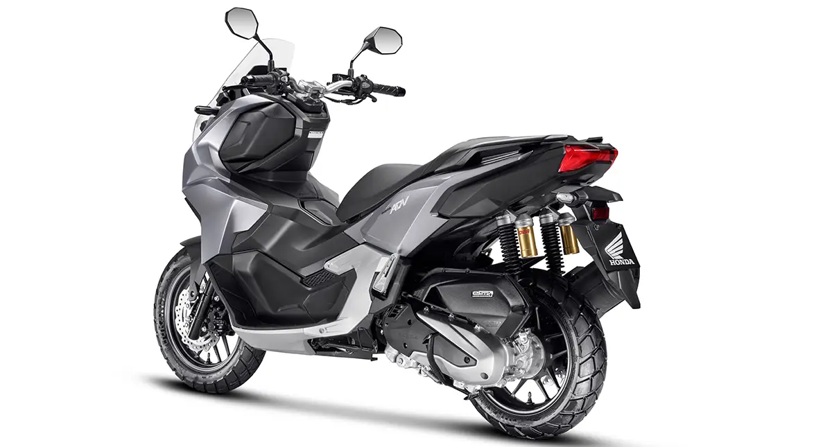 Nova Motocicleta Honda ADV 160 prata Lateral da moto