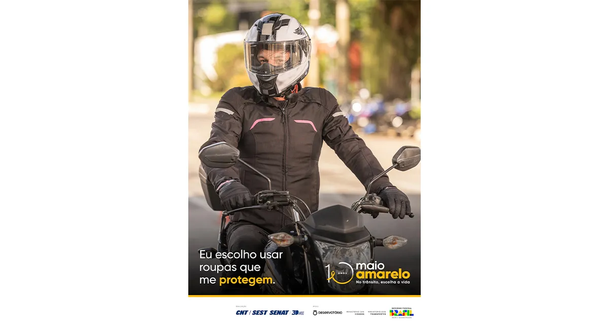 Cartaz Maio Amarelo Piloto com equipamentos de Segurança na Moto